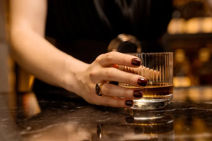 A Lady with Glass of Vodka